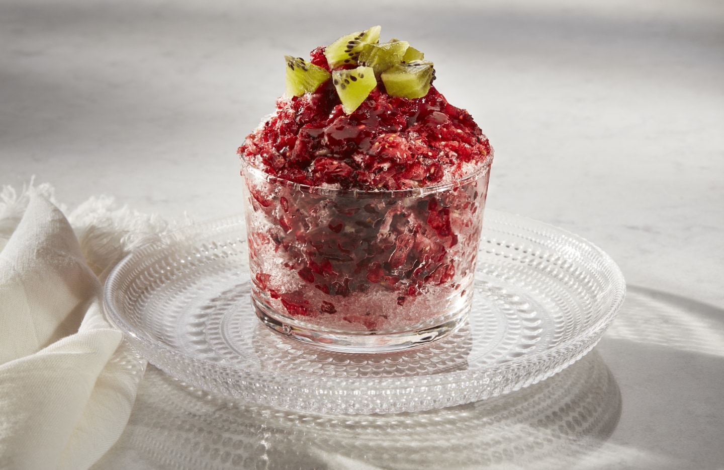 Shaved ice dessert with fruit syrup and fruit Shaved ice dessert with fruit syrup and fruit